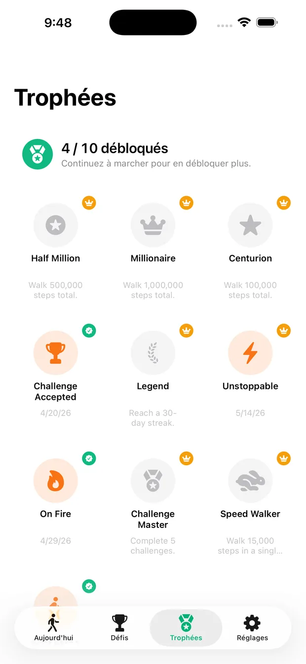Écran Succès de WalkQuest avec les badges d'étapes clés